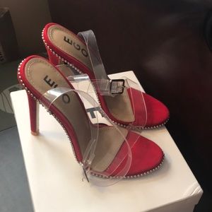 Red heels with clear strap.